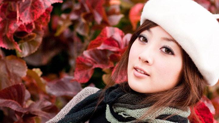 Beautiful Asian Girl Face Closeup in White Cap